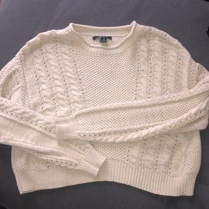 Cropped cable knit sweater